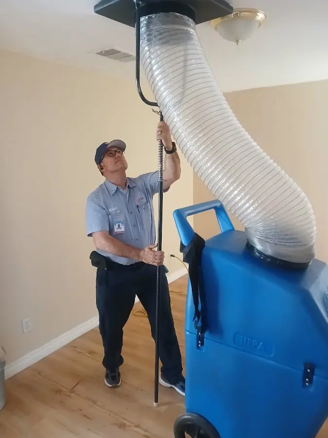 Mini Split Installation technician using HEPA equipment in Jupiter Farms